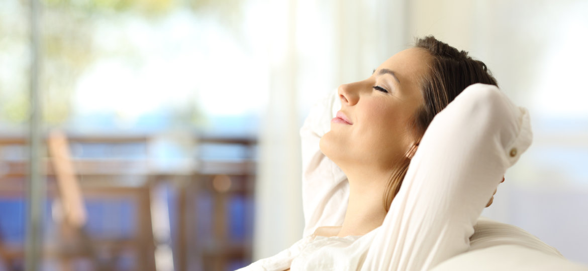 Woman relaxing on vacations in an apartment