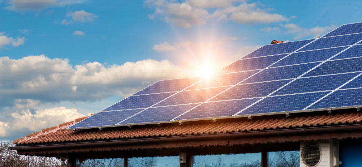 Solar panel on a red roof